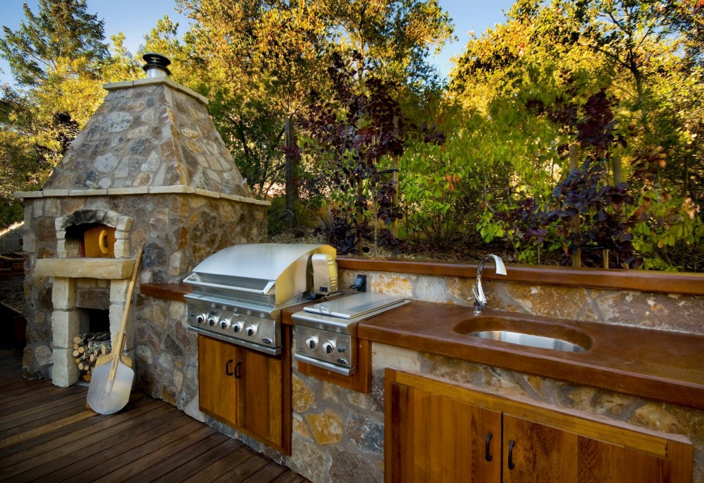 If you enjoy dining alfresco, an outdoor kitchen can double your pleasure by allowing you to cook outside as well. Photo: Riptide Construction, Inc. (2016)