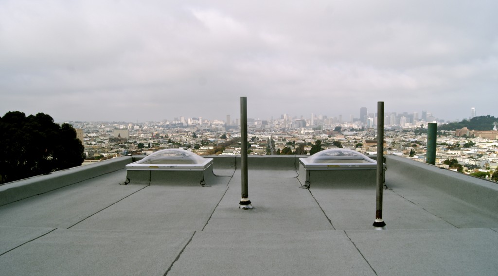pipe jacks on roof overlooking city